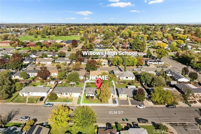 an aerial view of residential building with parking space