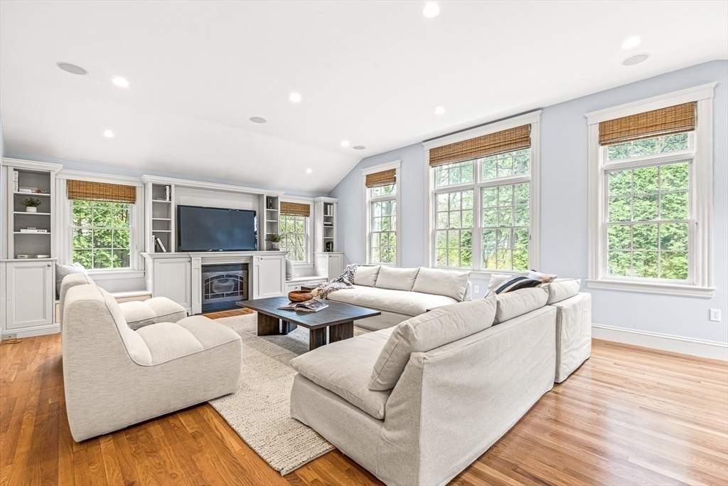 24 Birch Road Wellesley, MA 02482 - Photo 17 of 40 a living room with fireplace furniture and a large window