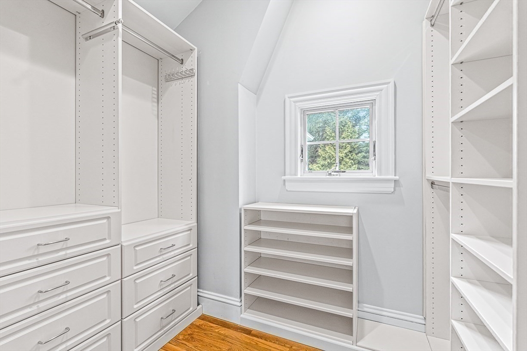 24 Birch Road Wellesley, MA 02482 - Photo 26 of 40 a view of walk in closet with empty racks