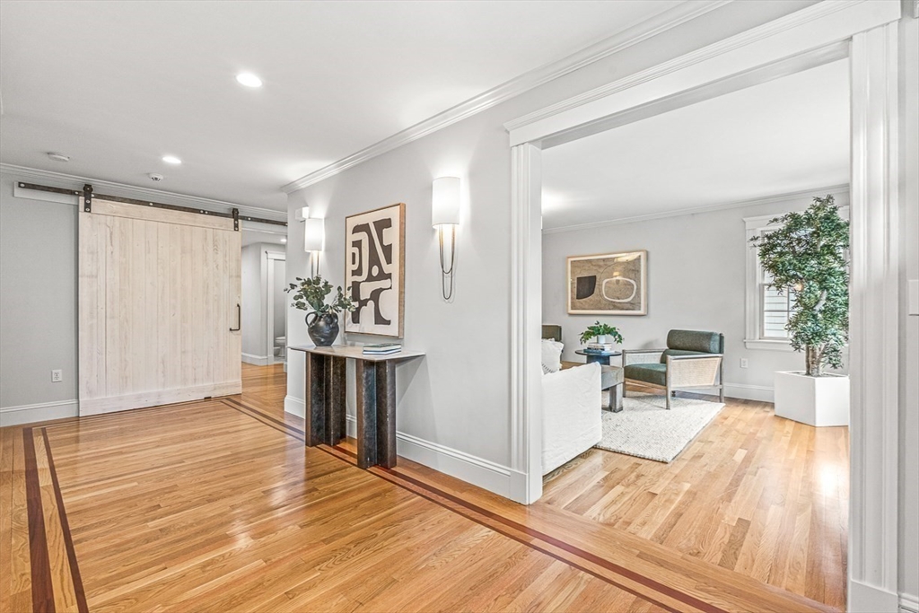 24 Birch Road Wellesley, MA 02482 - Photo 3 of 40 a view of a livingroom with furniture and a window