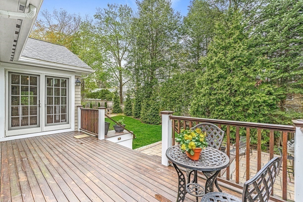 24 Birch Road Wellesley, MA 02482 - Photo 33 of 40 a view of a chair and tables on the wooden floor