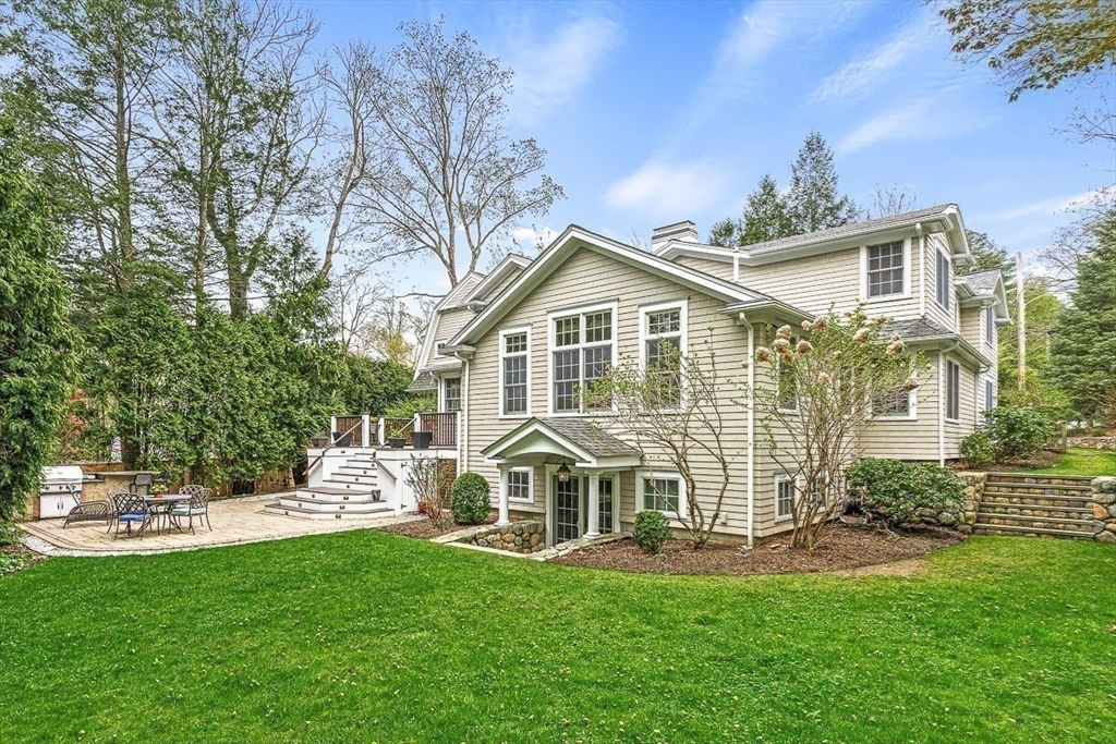 24 Birch Road Wellesley, MA 02482 - Photo 38 of 40 a front view of a house with a yard