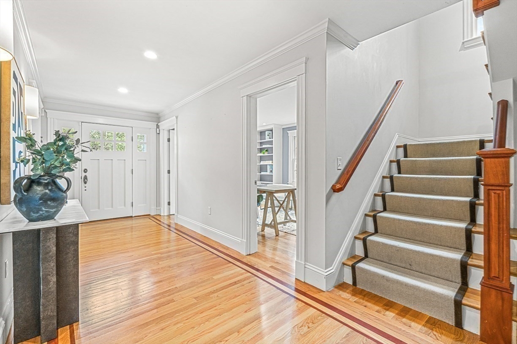 24 Birch Road Wellesley, MA 02482 - Photo 4 of 40 a view of entryway with wooden floor and stairs