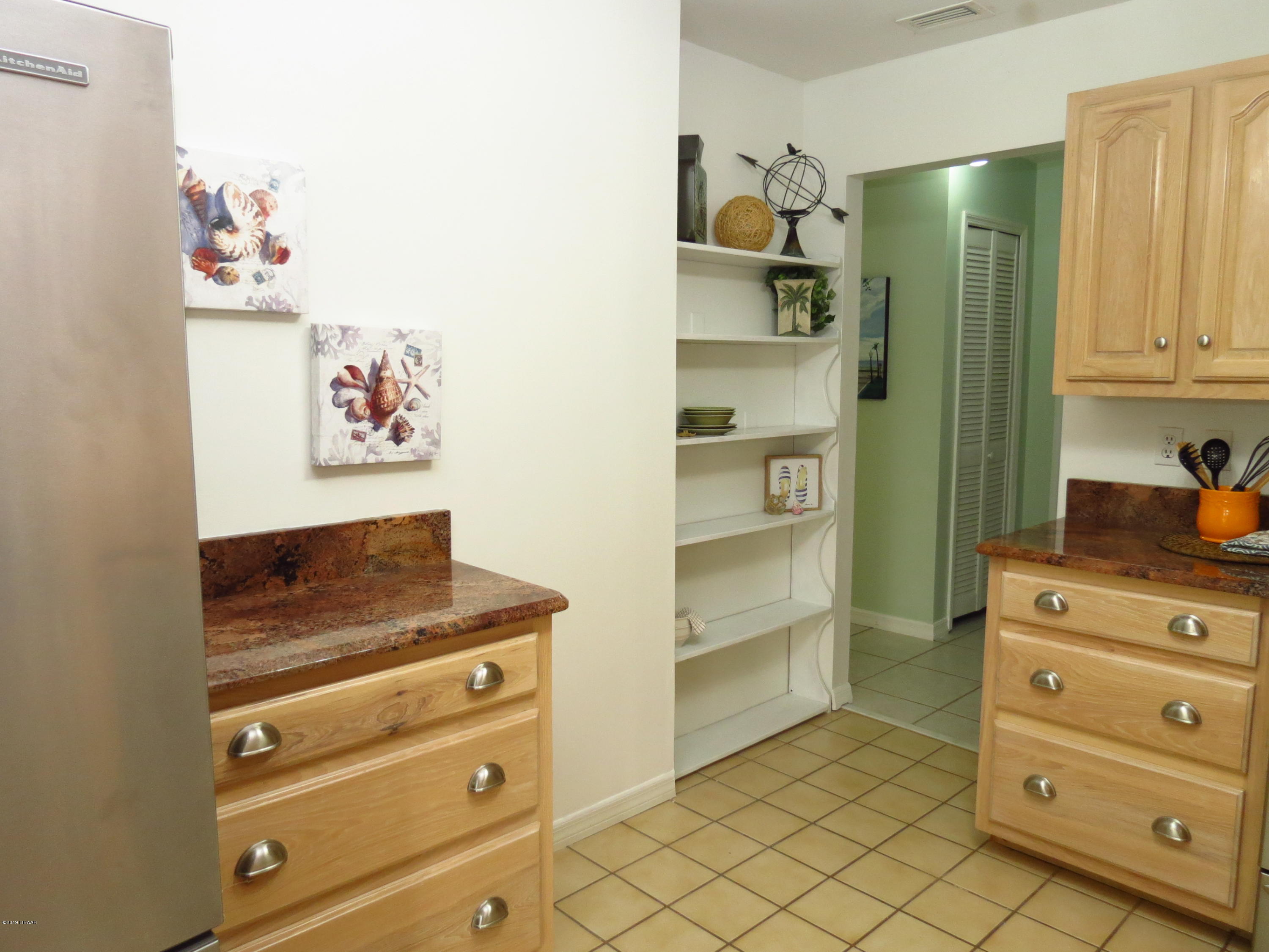 624 Robin Road, Unit A Ormond Beach, FL 32176 - Photo 4 of 31 kitchen also