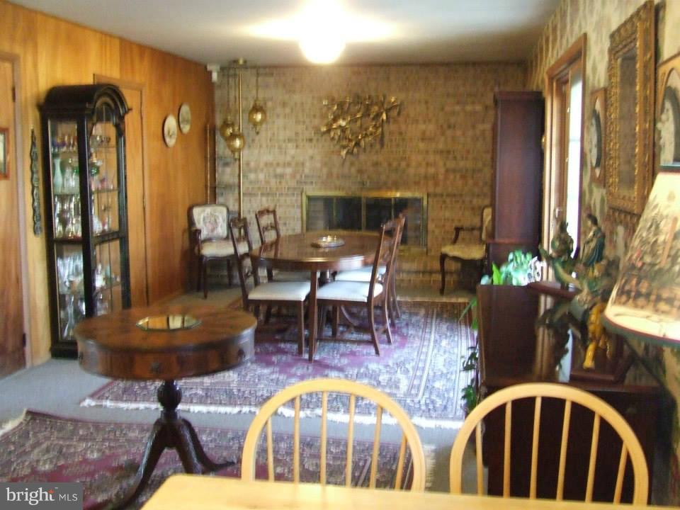 8610 Contee Road Laurel, MD 20708 - Photo 14 of 15 a living room with furniture and a fireplace