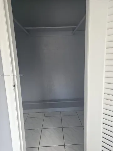 a bathroom with a toilet a sink and bathtub