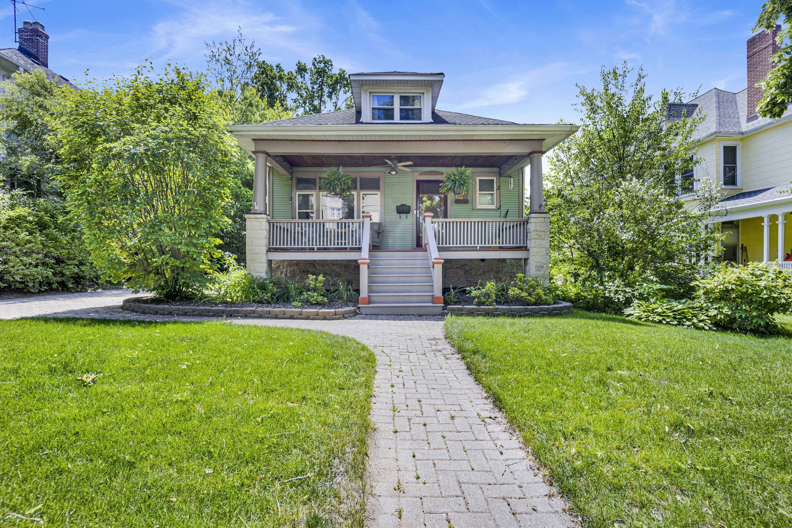 103 Pine Avenue Riverside, IL 60546 - Photo 1 of 42 a front view of a house with garden