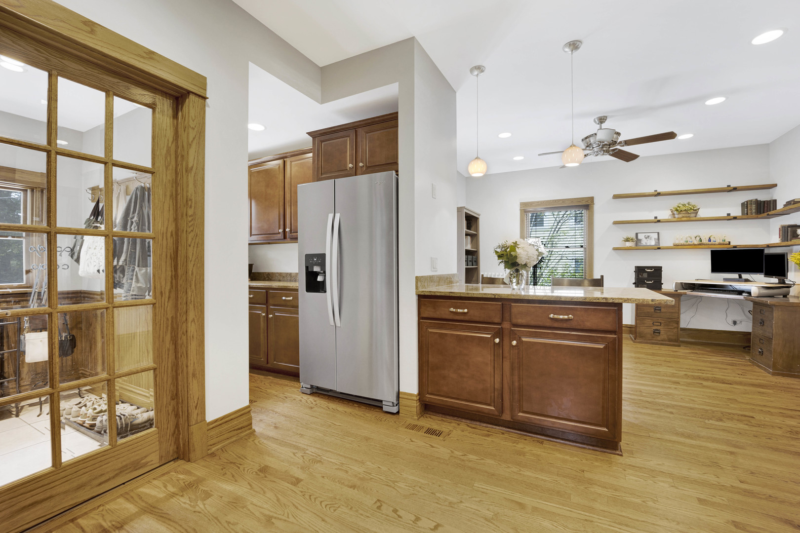 103 Pine Avenue Riverside, IL 60546 - Photo 11 of 42 a kitchen with stainless steel appliances granite countertop a refrigerator and a stove top oven