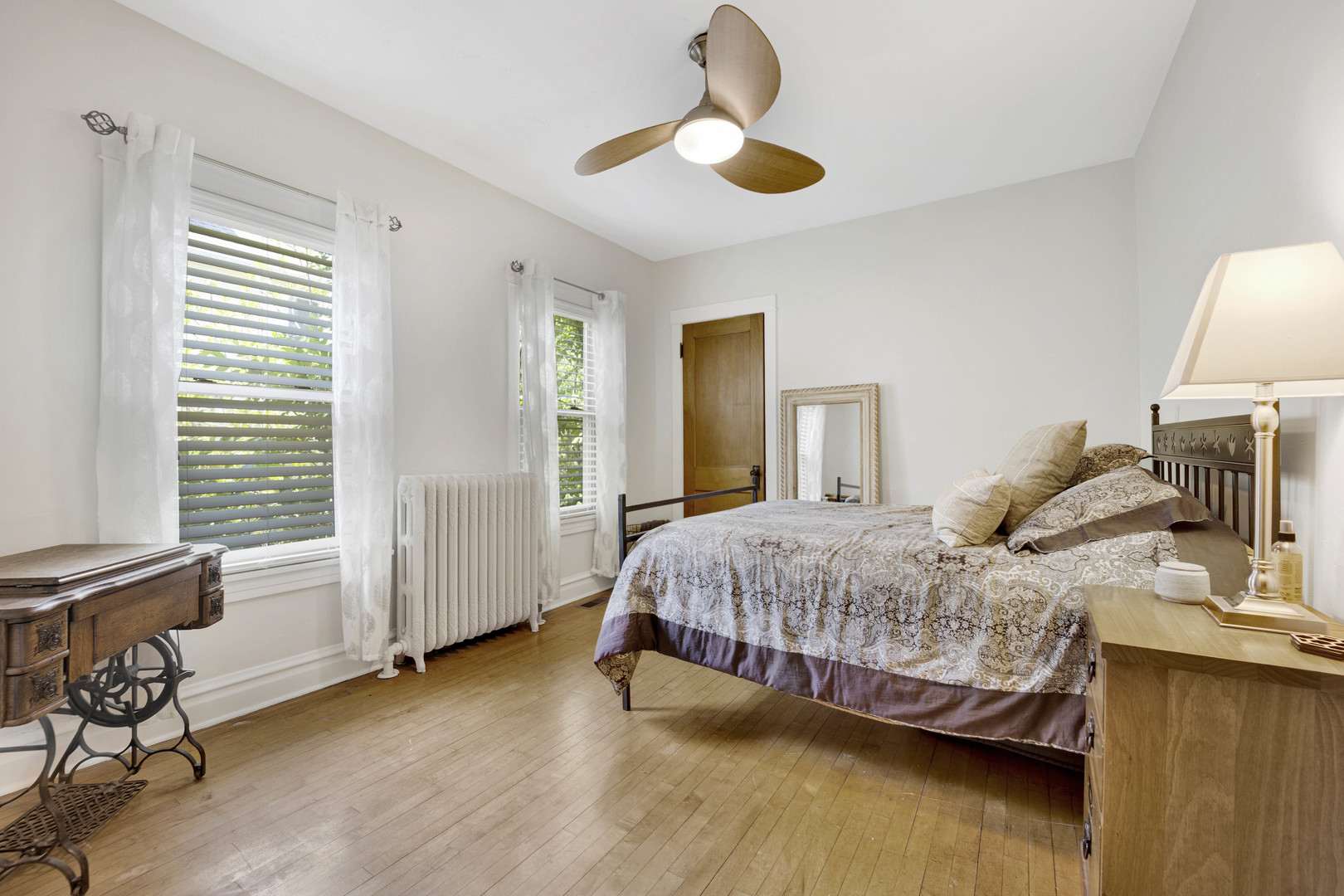 103 Pine Avenue Riverside, IL 60546 - Photo 15 of 42 a bedroom with a bed and wooden floor