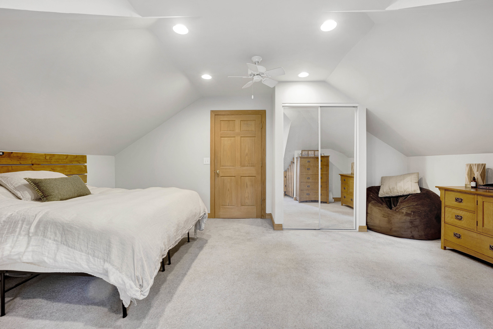 103 Pine Avenue Riverside, IL 60546 - Photo 18 of 42 a spacious bedroom with a bed and a couch
