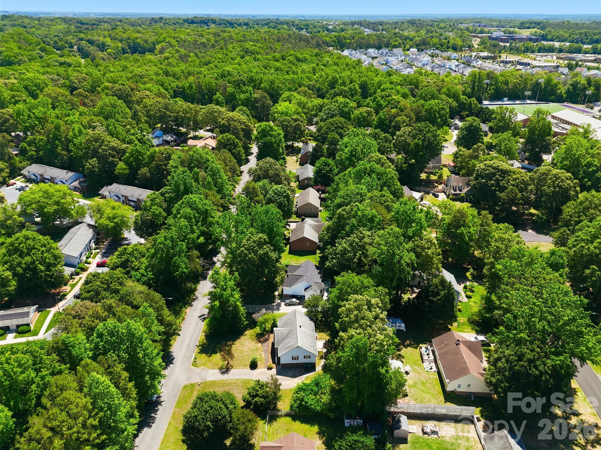 913 Pleasant Ridge Road Fort Mill, SC 29715 - Photo 36 of 40 an aerial view of residential houses with outdoor space and trees