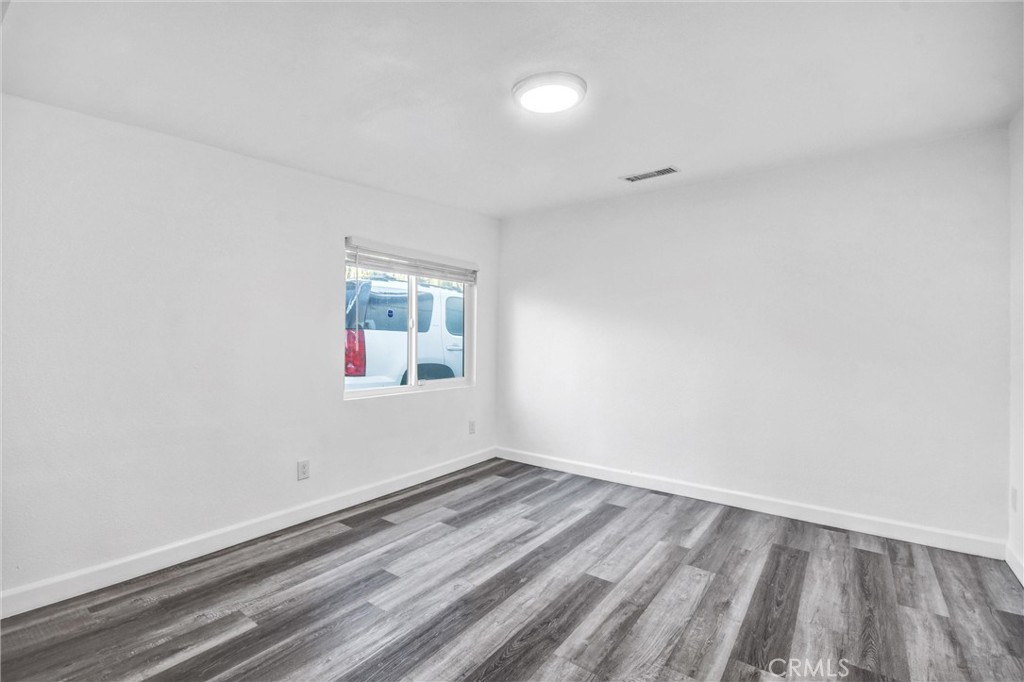 3913 Walnut Street Baldwin Park, CA 91706 - Photo 18 of 25 wooden floor in an empty room