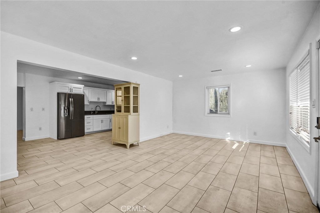 3913 Walnut Street Baldwin Park, CA 91706 - Photo 5 of 25 a view of an empty room and window