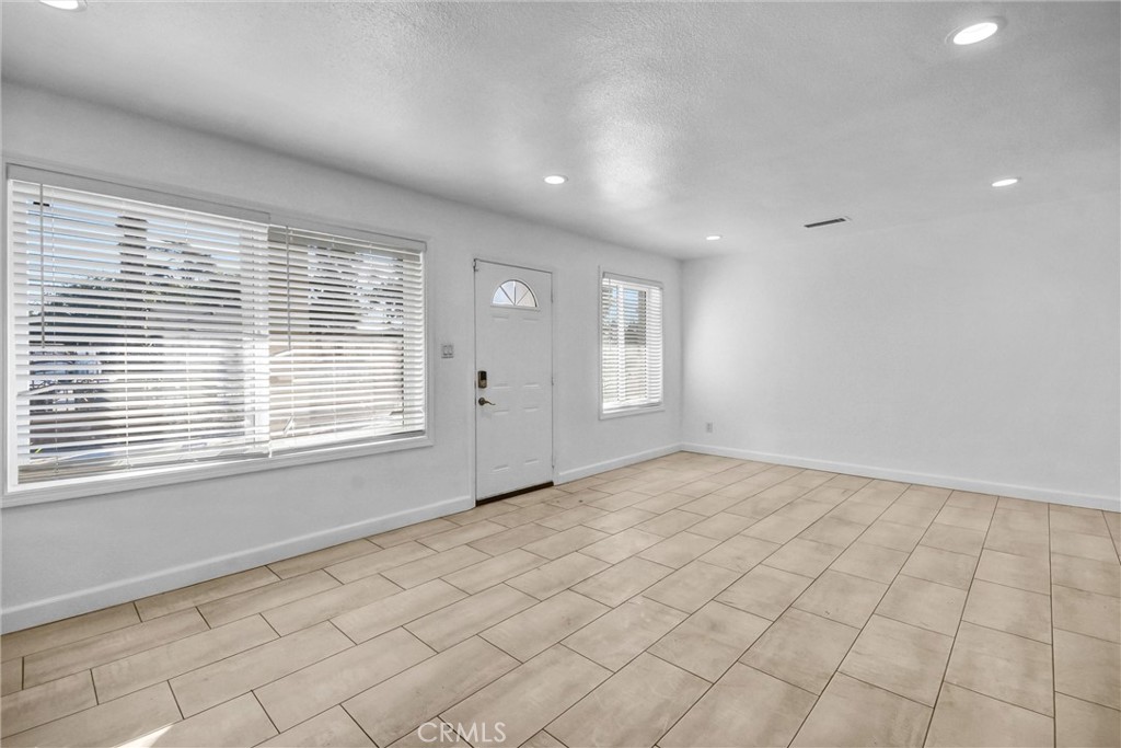 3913 Walnut Street Baldwin Park, CA 91706 - Photo 7 of 25 a view of an empty room and window