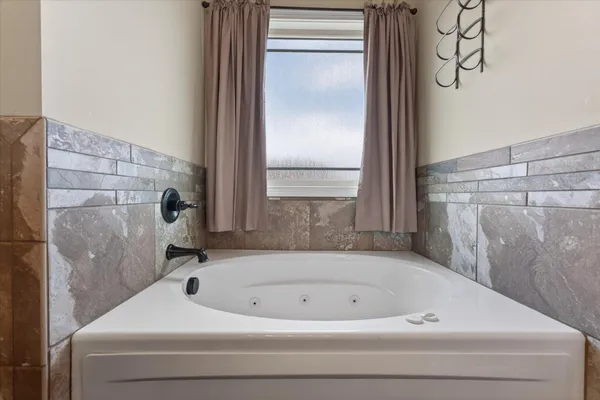 a bathroom with a bathtub