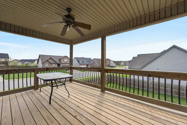 a view of a balcony with furniture