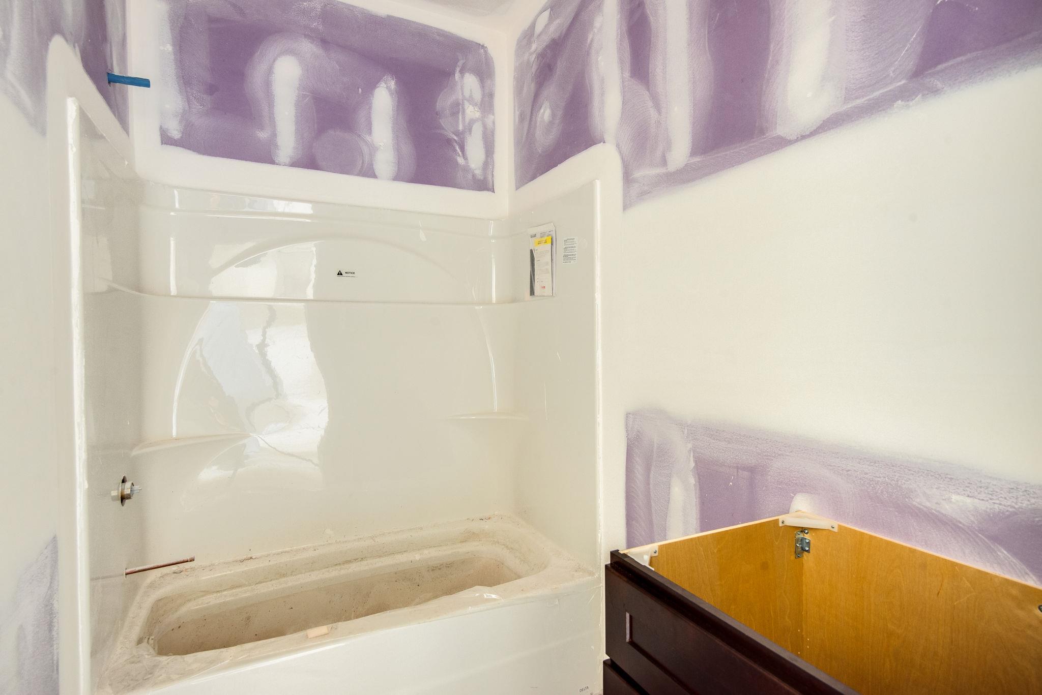 1807 Abiff Road Burns, TN 37029 - Photo 13 of 28 a bathroom with a bathtub