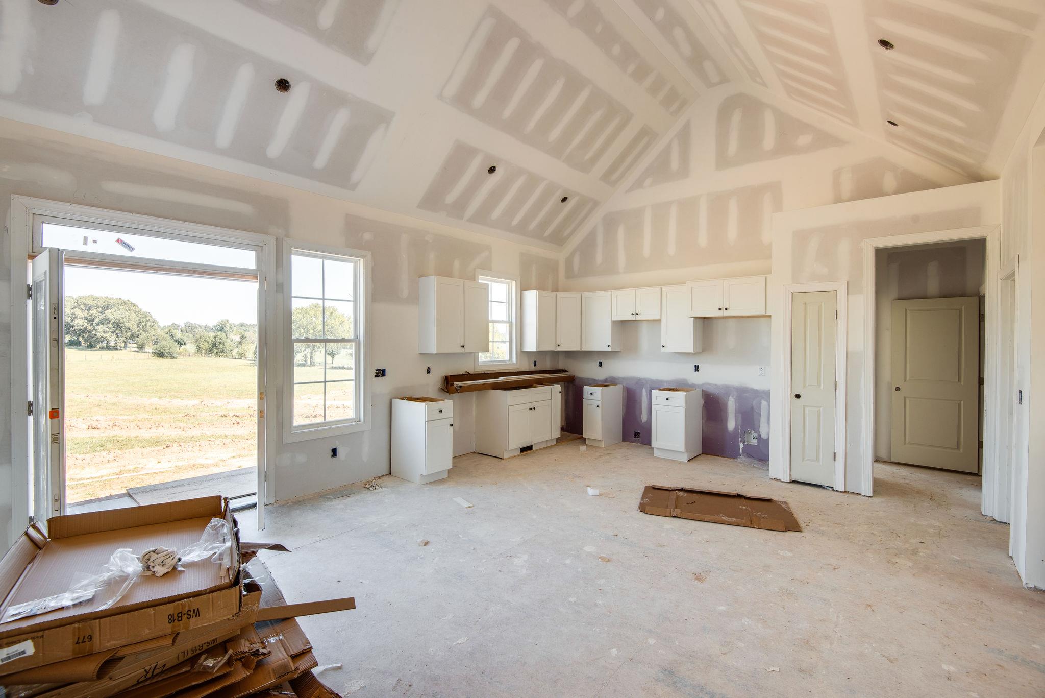 1807 Abiff Road Burns, TN 37029 - Photo 2 of 28 a living room with furniture and a open kitchen view