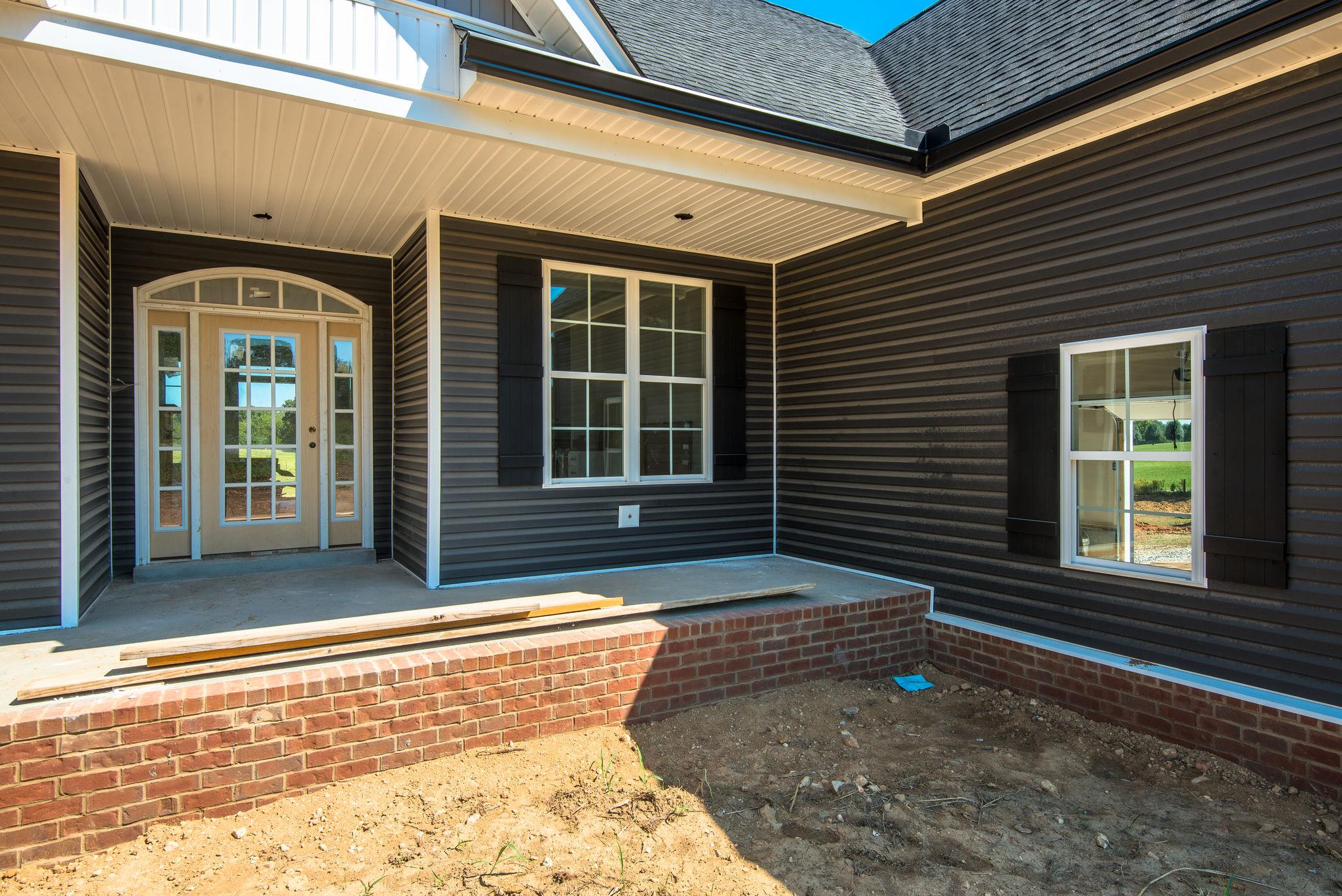 1807 Abiff Road Burns, TN 37029 - Photo 26 of 28 a front view of a house with a large window