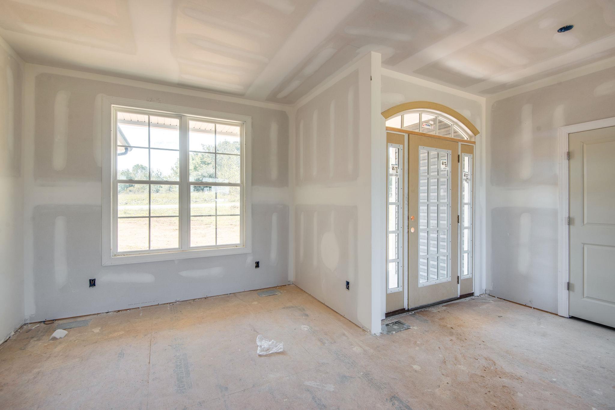 1807 Abiff Road Burns, TN 37029 - Photo 5 of 28 an empty room with windows and closet