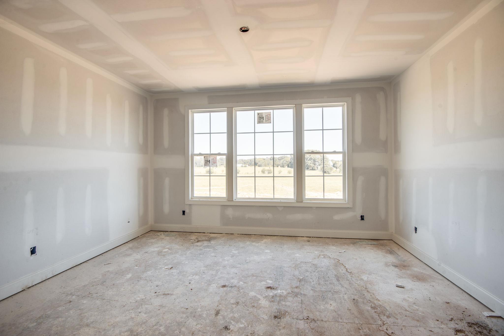 1807 Abiff Road Burns, TN 37029 - Photo 6 of 28 an empty room with a window