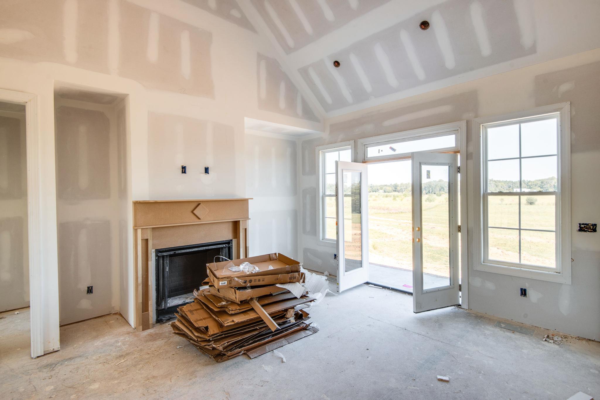 1807 Abiff Road Burns, TN 37029 - Photo 7 of 28 a living room with furniture and a fireplace