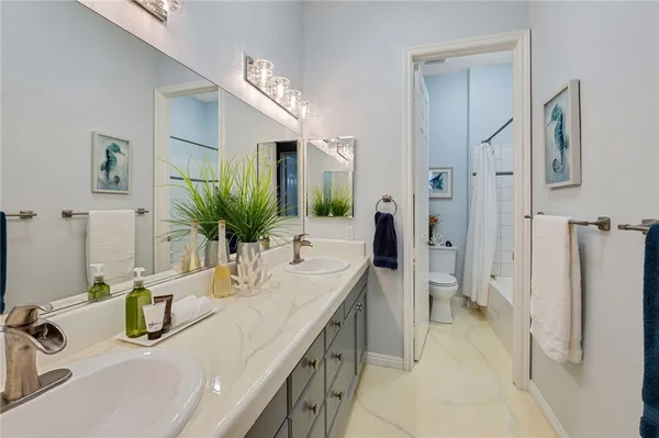 a bedroom with bed and window