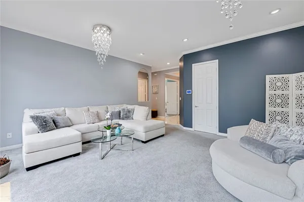 a view of a house with sitting area and garden