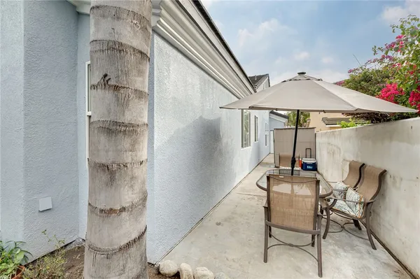 a bathroom with double vanity a mirror and a shower