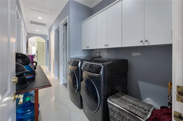 an aerial view of multiple houses with yard