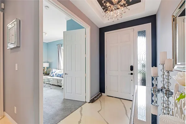 a living room with furniture and a table