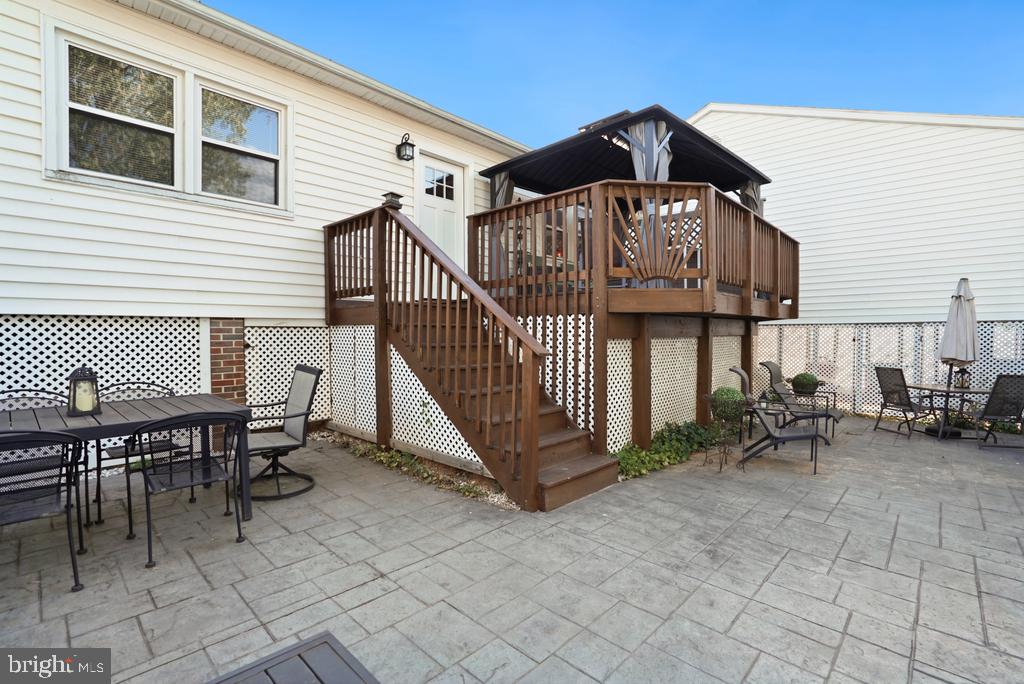 13203 Delaney Road Woodbridge, VA 22193 - Photo 38 of 43 Charming outdoor retreat with deck.