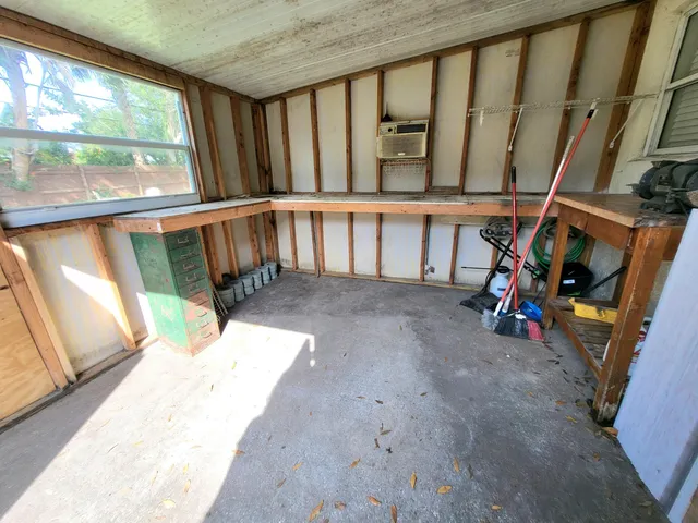 a view of a porch with wooden floor and stairs