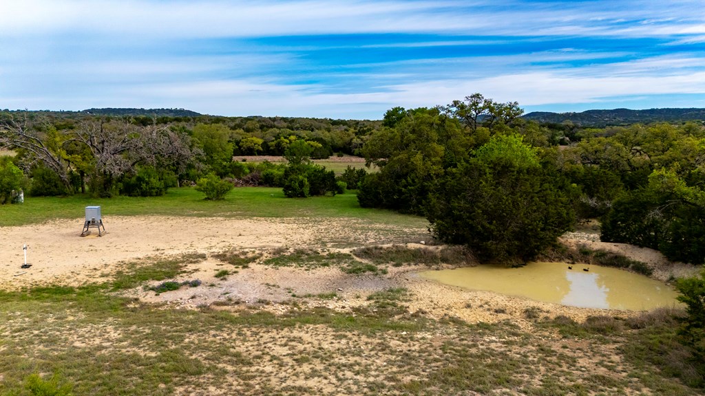 360 Bluff Creek Road North Center Point, TX 78010 - Photo 57 of 64 a view of a lake with a mountain