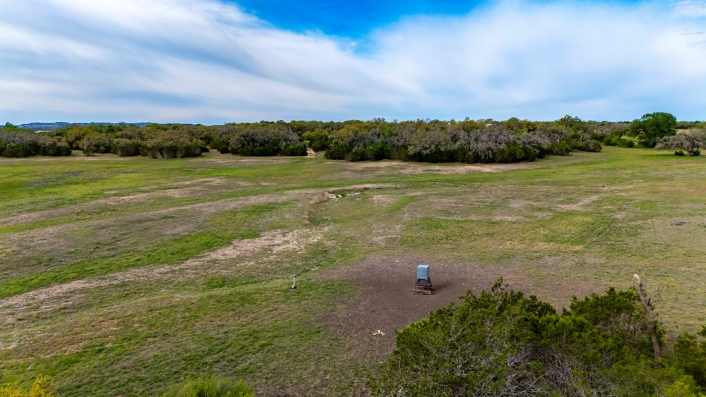 360 Bluff Creek Road North Center Point, TX 78010 - Photo 62 of 64 a view of a lake with houses in back