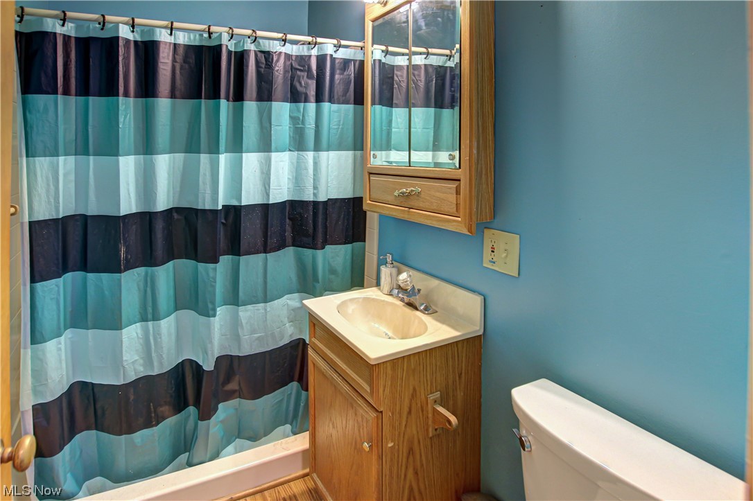 3434 West Pleasant Valley Road Cleveland, OH 44134 - Photo 12 of 34 Bathroom featuring toilet and oversized vanity