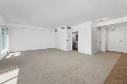 an empty room with windows