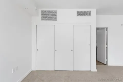 a bathroom with a sink double vanity and a mirror