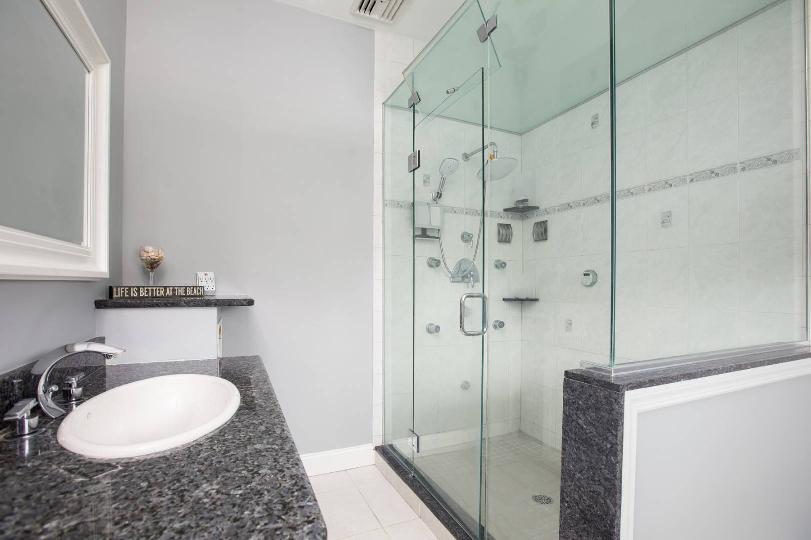 2 Clay Pit Road Remsenburg, NY 11972 - Photo 13 of 19 a bathroom with a sink and shower