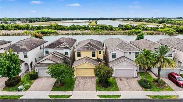 an aerial view of a house with a garden