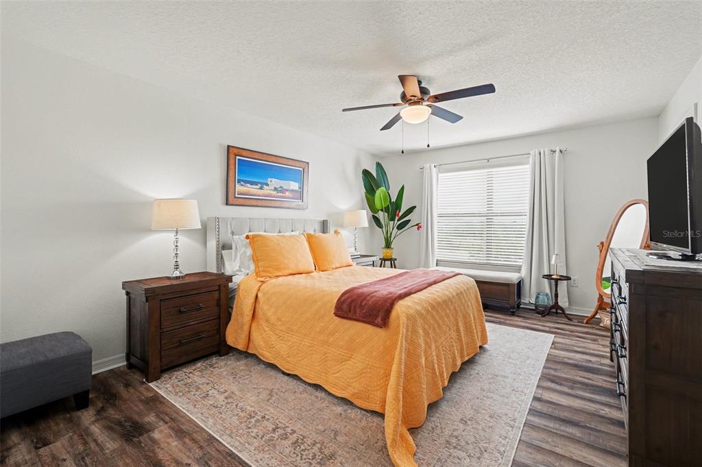 1606 Acadia Harbor Place Brandon, FL 33511 - Photo 16 of 38 a bedroom with a large bed and a window