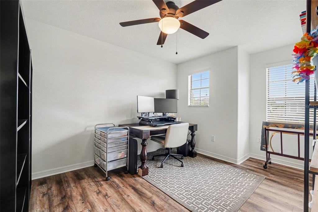1606 Acadia Harbor Place Brandon, FL 33511 - Photo 23 of 38 a view of a workspace with furniture and a window
