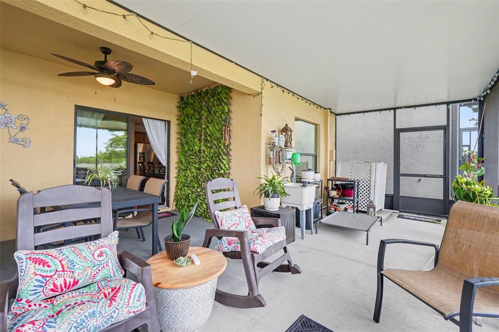 1606 Acadia Harbor Place Brandon, FL 33511 - Photo 25 of 38 a living room with furniture and a potted plant