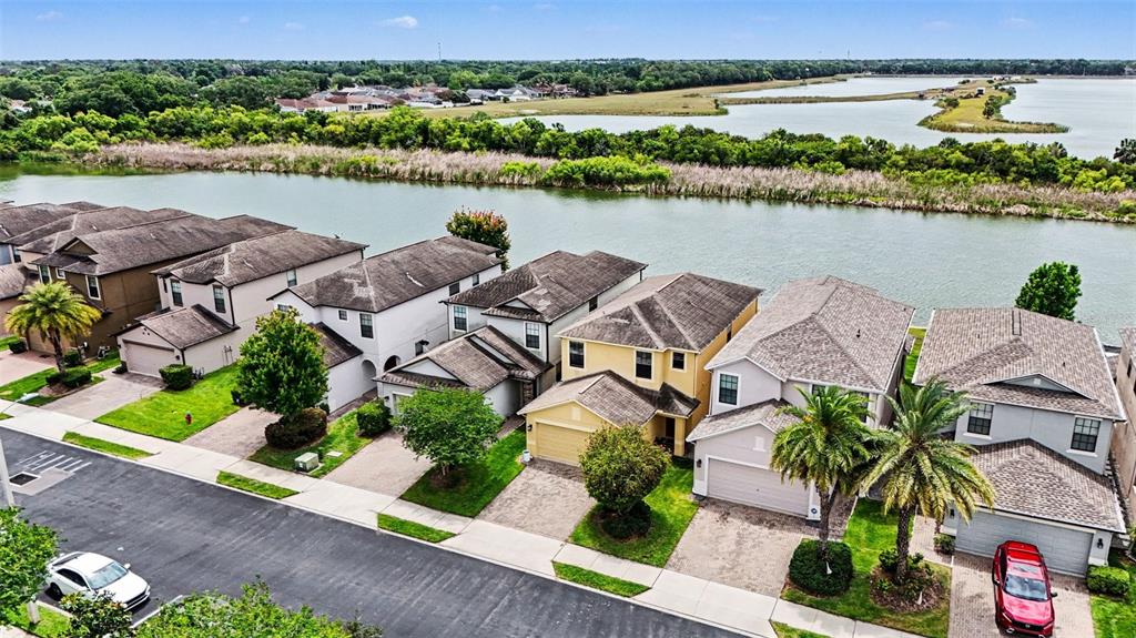 1606 Acadia Harbor Place Brandon, FL 33511 - Photo 28 of 38 an aerial view of a house with outdoor space and lake view