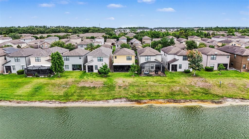 1606 Acadia Harbor Place Brandon, FL 33511 - Photo 29 of 38 an aerial view of residential houses with outdoor space and trees