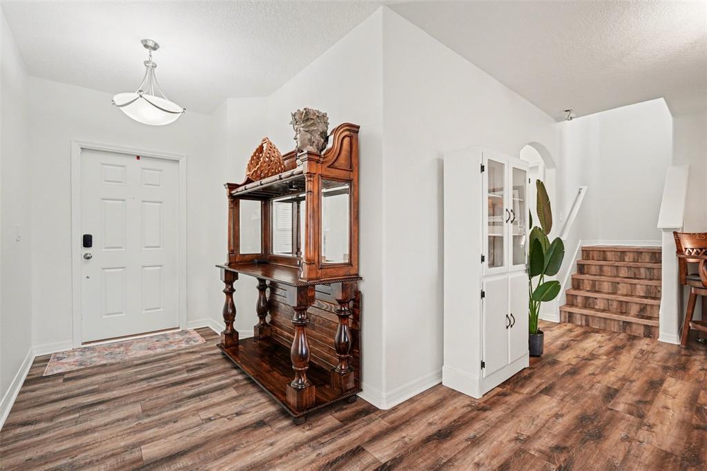 1606 Acadia Harbor Place Brandon, FL 33511 - Photo 6 of 38 a view of livingroom with furniture and wooden floor