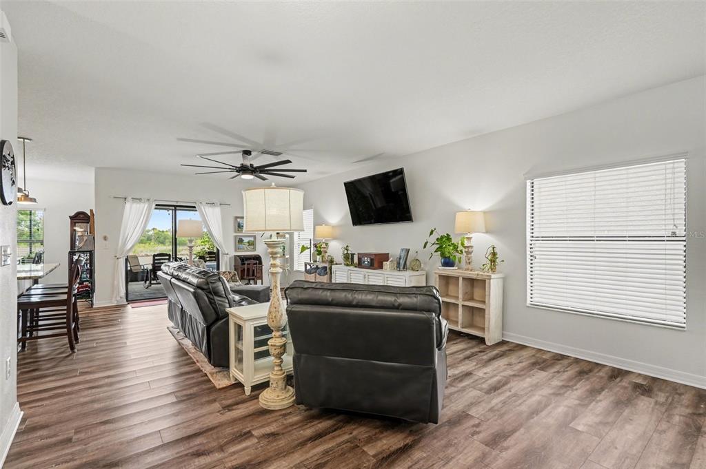 1606 Acadia Harbor Place Brandon, FL 33511 - Photo 9 of 38 a living room with furniture and flat screen tv