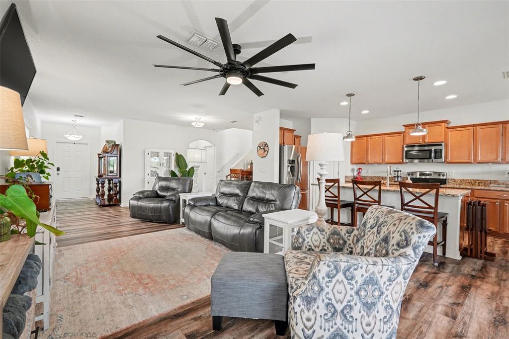 1606 Acadia Harbor Place Brandon, FL 33511 - Photo 10 of 38 a living room with furniture kitchen view and a window