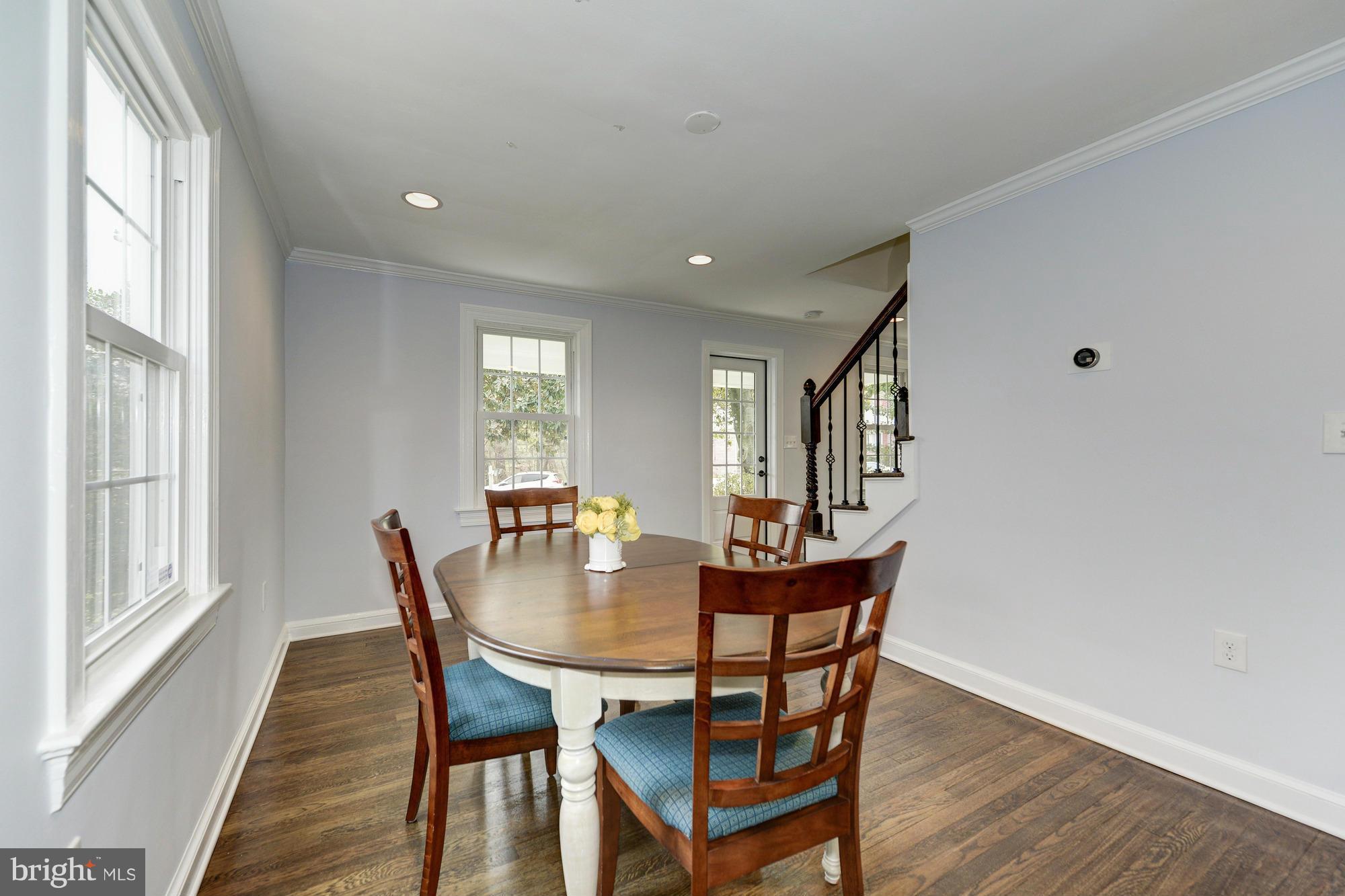 3510 Russell Road Alexandria, VA 22305 - Photo 13 of 30 a view of a dining room with furniture window and wooden floor