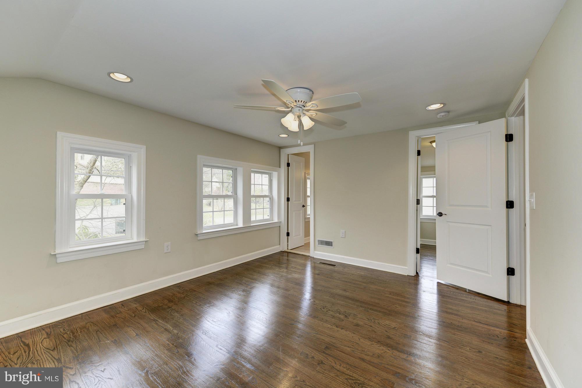 3510 Russell Road Alexandria, VA 22305 - Photo 15 of 30 a view of an empty room with wooden floor and a window